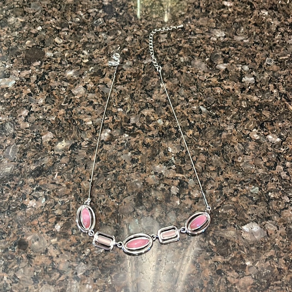 Lia Sophia beautiful necklace. The necklace is 15” long with and ext 3 “